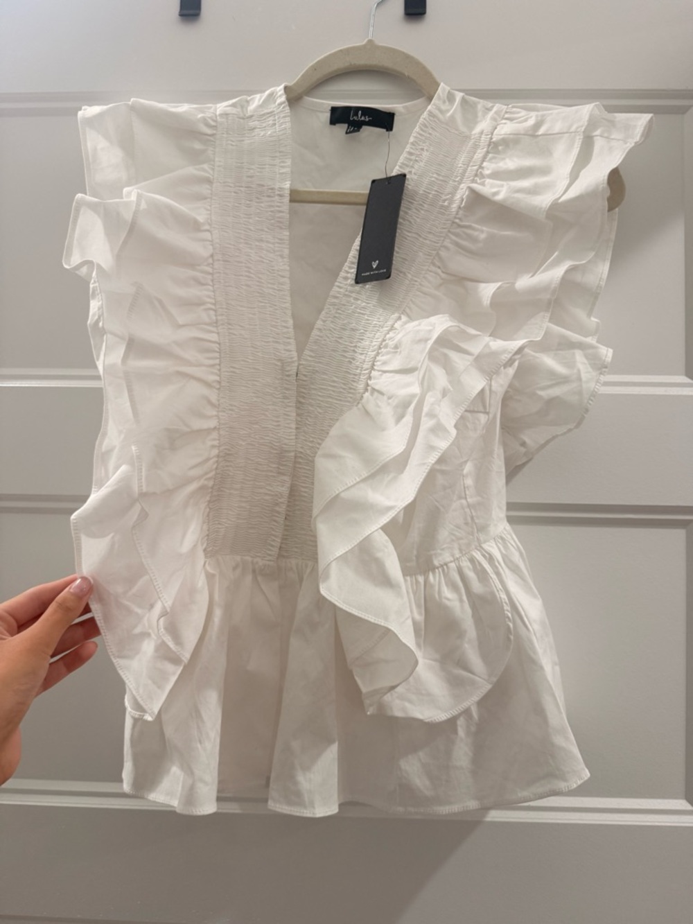 Lulu's Ivory Ruffled Smocked V-Neck Blouse